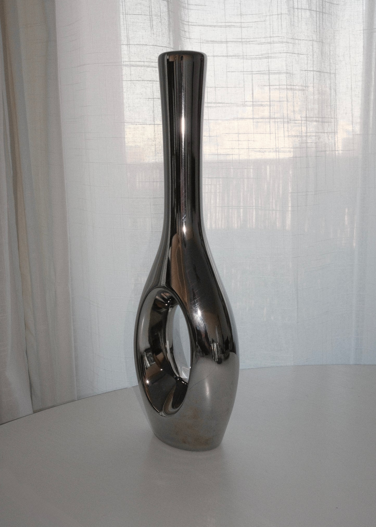 vase organique en céramique chromée