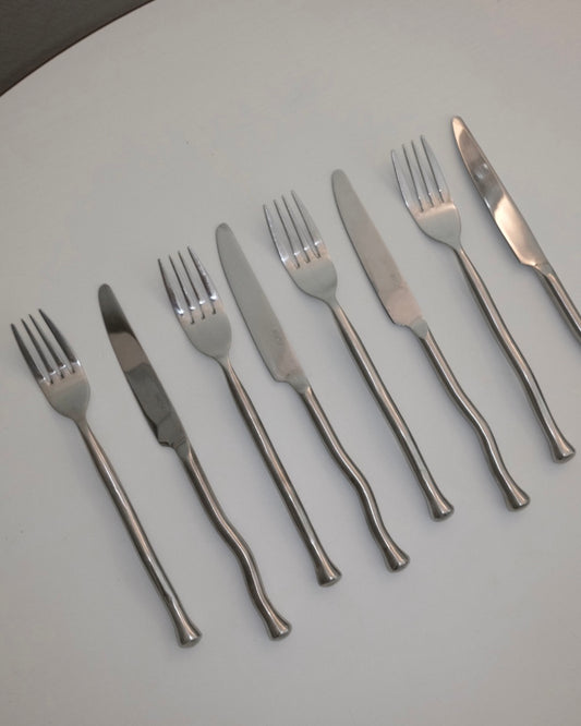 set de 4 fourchettes & couteaux wavy